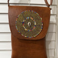 leather and bead crossbody bag